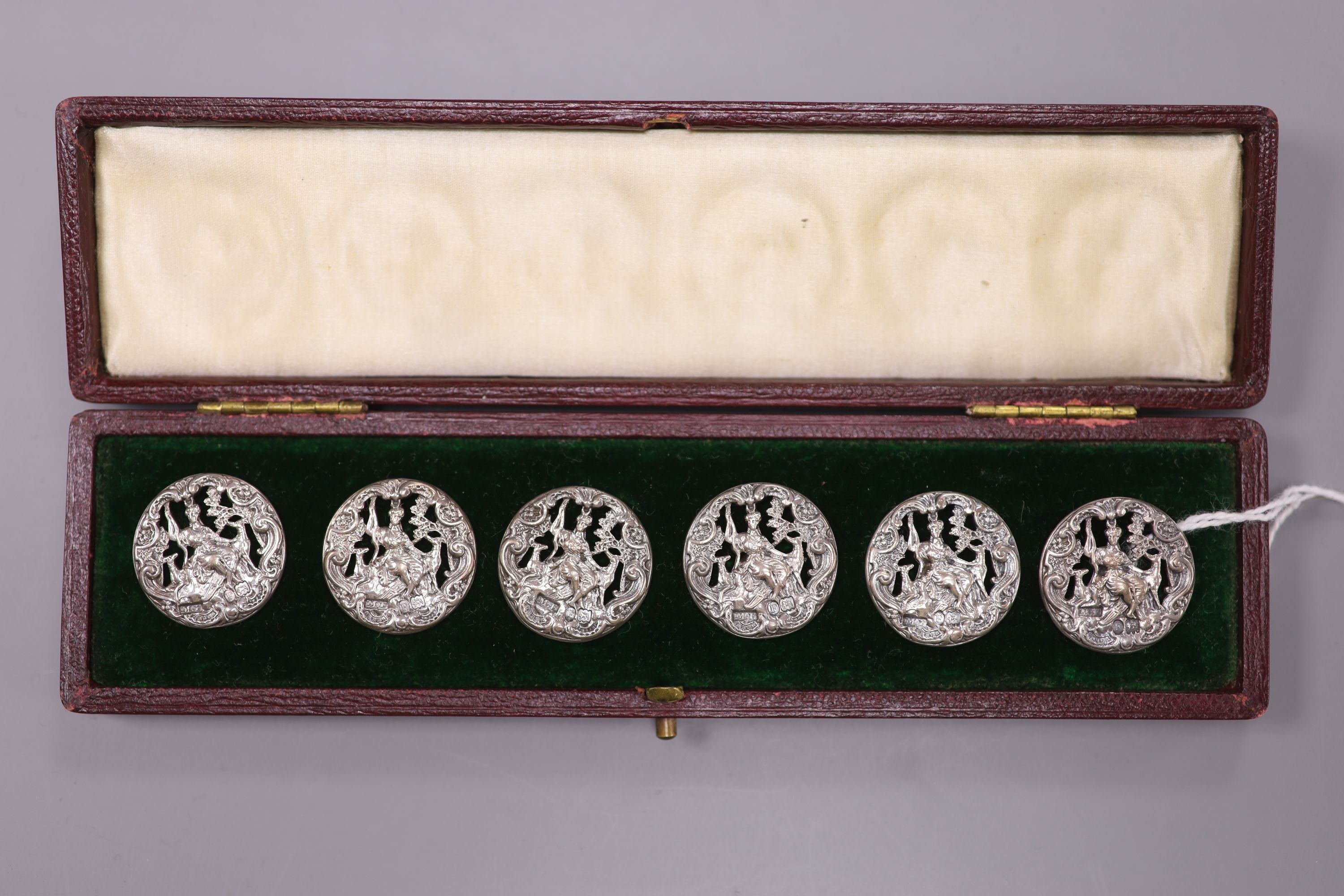 A set of six Victorian silver buttons, cased, depicting Diana the Huntress